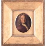 An 18th century oval portrait miniature of a gentleman, bust length, oil on copper, 7 cm x 5.6 cm,
