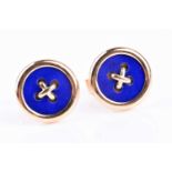 A pair of yellow metal and lapis cufflinks, designed as a pair of buttons, marked 18K to verso, 12