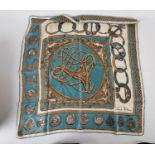 A Hermes scarf designed by Phillipe Ledoux, with a pattern of horses and riders, together with a