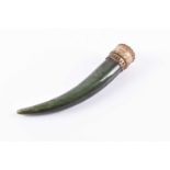 An Indian Mughal silver gilt and jade pendant, of dagger form, the spinach jade pendant with gilt