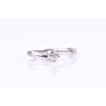 A 9ct white gold and solitaire diamond ring, set with a round brilliant-cut diamond of approximately