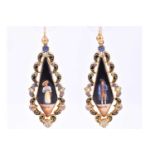 A pair of late 19th century gilt metal and enamel earrings, of elongated lozenge design, each