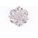 A white gold and diamond cluster brooch, formed of seven clusters of small round-cut diamonds within
