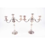 A pair of Gorham filled sterling silver three-sconce candelabra, on a tapering column and circular