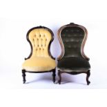 Two Victorian button-back easy chairs, with carved show wood frames, one rosewood, the other