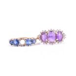 A 9ct yellow gold and amethyst ring, set with three mixed oval-cut amethysts within a border of