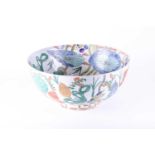 A large Chinese lotus bowl, 20th century, the decorated throughout with birds amongst lotus flowers,