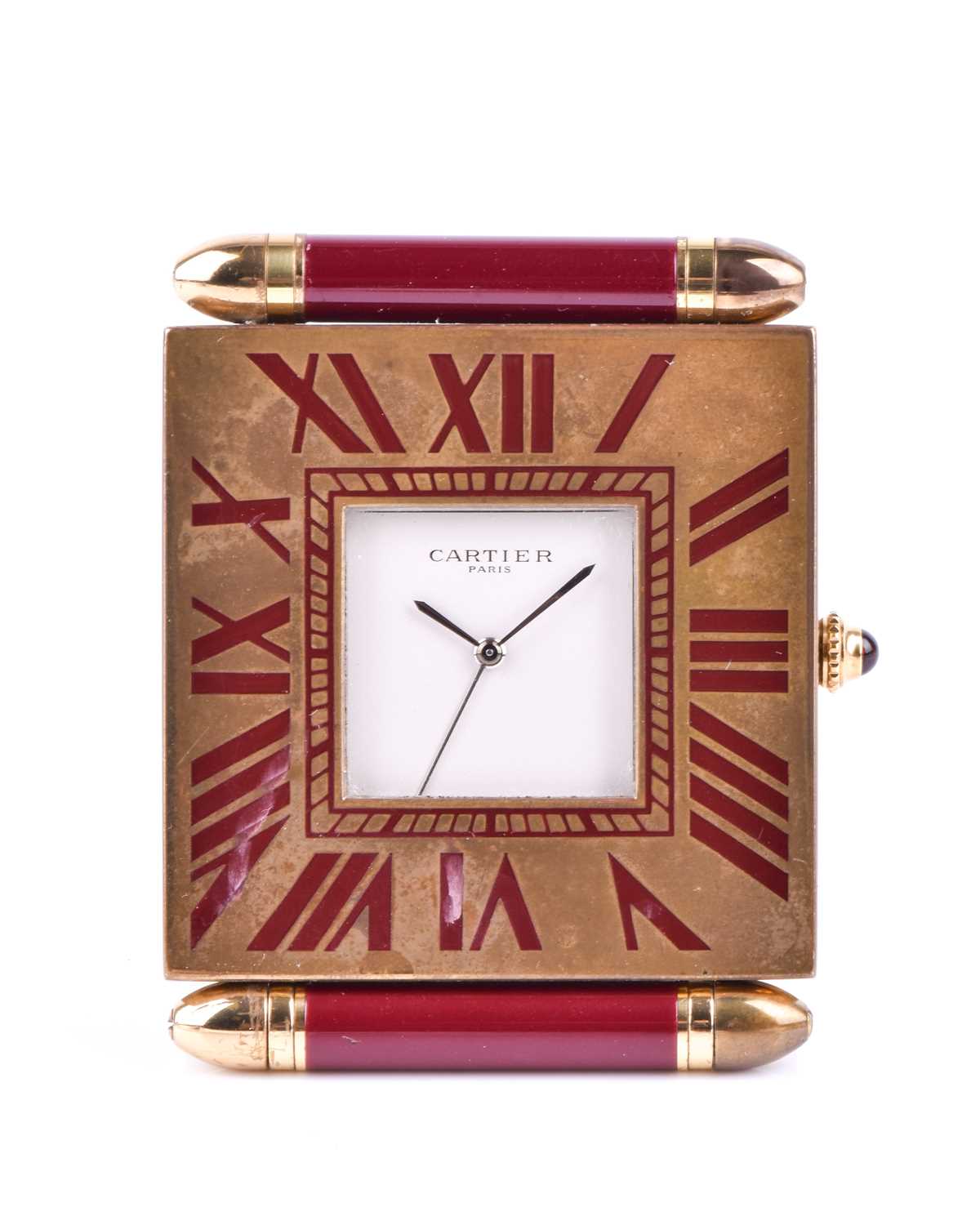 A Cartier travel clock, of square form with gilt metal case with claret lacquered Roman numerals, - Image 2 of 13
