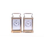 Two late 19th century French gilt brass four-glass carriage clocks, each with white enamel dial,