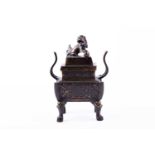 A Chinese archaic style bronze censer, Fangding, Qing, the cover with dog of fo finial with open