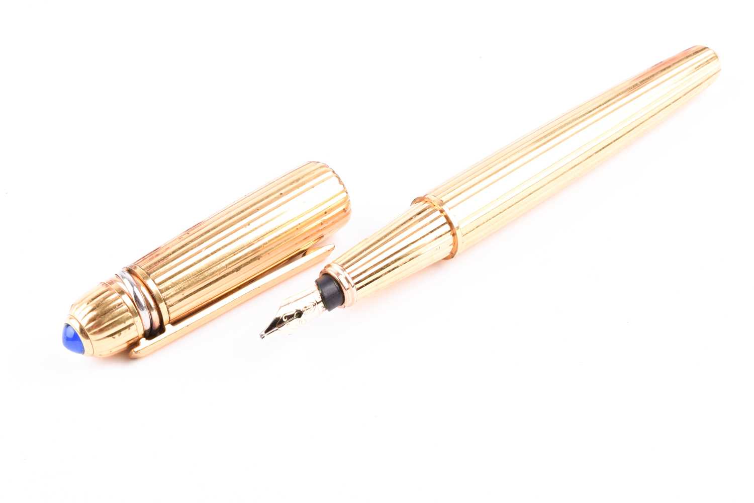 Pasha de Cartier. A gold plated fountain pen, with 18k nib, the body with ribbed decoration, the lid - Image 2 of 7