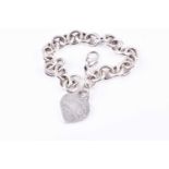 Tiffany & Co, New York. A silver bracelet, bearing heart-shaped 'Please return to Tiffany & Co New