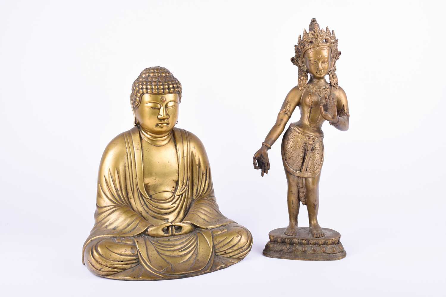 A Japanese hollow cast brass figure of the Amida Buddha, his hands in mida no jo-in, together with a