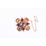A late 19th century yellow gold and multi-gemstone brooch, centred with an amethyst, four citrines
