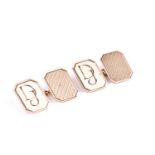 A pair of 9ct yellow gold engine-turned cufflinks, each plaque of chamfered rectangular form, with