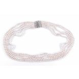 An impressive five strand cultured pearl necklace, longest strand 84 cm, the pearls approximately