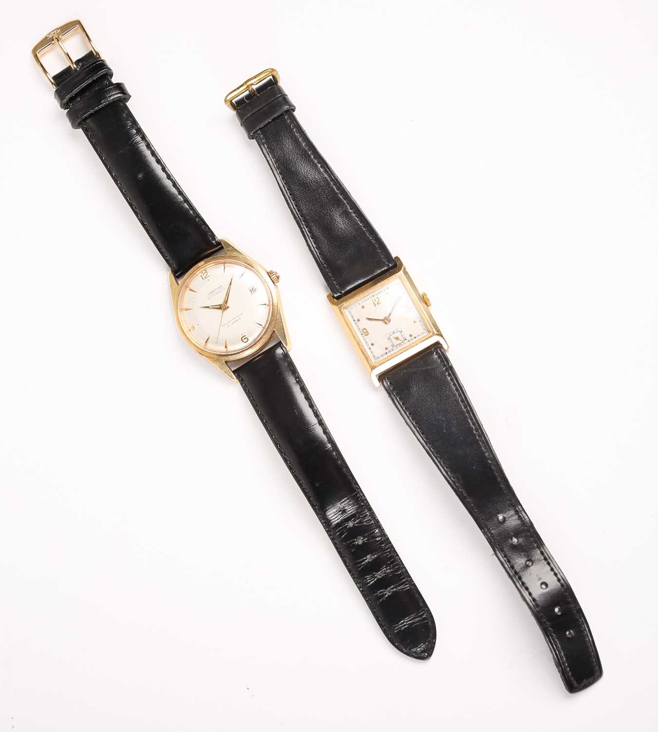 A 1950s 18ct gold mechanical wristwatch, with square silvered dial and gilt numerals, in an 18ct