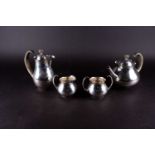 A mid-20th century four-piece silver tea set, Sheffield 1964 by Elkington, comprising teapot, hot