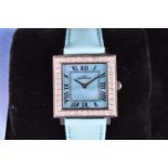 An Aqua Marin dress watch, with square mother-of-pearl dial, quartz movement, on a turquoise leather