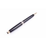 A Montblanc Meisterstuck propelling pencil, with black resin cap and body, and gold plated mounts.