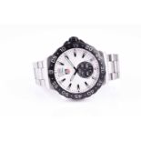 A Tag Heuer Formula 1 stainless steel wristwatch the white dial with baton indices, date aperture,