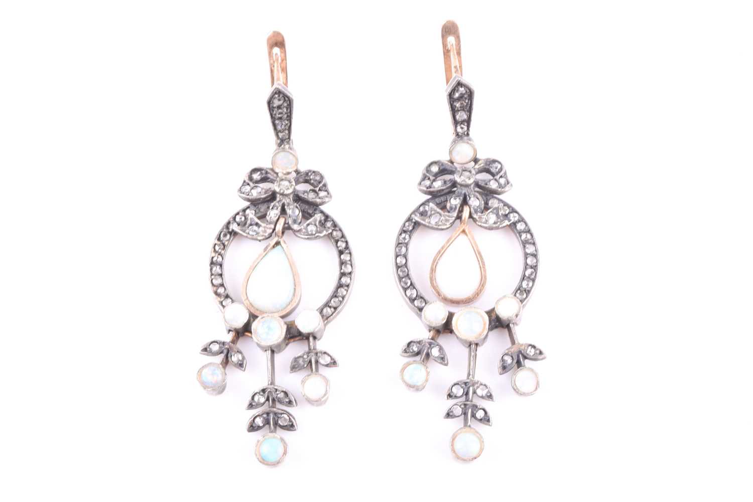 A pair of silver gilt, diamond, and opal drop earringsthe bow-surmounted circular mount set with