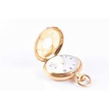 An 18ct yellow gold ladies half hunter pocket watchwith blue enamel numerals to outer cover,