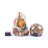 A septarian polished stone sphere, 13 cm high, together with two further polished stone fragments,
