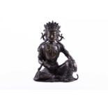 A bronze Avalokitesvara, 18th/19th century, with raised diadem, dressed in robes and beads, seated