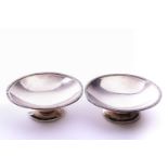 A pair of silver pedestal dishes, James Edward Barry, Sheffield 1942, the circular dishes with a