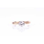An 18ct yellow gold and solitaire diamond ring, the round brilliant-cut diamond of approximately 0.
