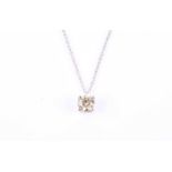 A solitaire diamond pendant, the round brilliant-cut diamond approximately 0.70 carats,