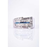 A diamond and sapphire ring, in the Art Deco taste, the white metal buckle-style mount inset with