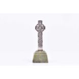 A silver St Matins cross, by Alexander Ritchie Iona, marked A.R. Iona and ICA, 1933, raised on a