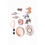 A group of costume jewellery items, to include a yellow metal mounted pink and white enamel brooch