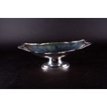 A George VI silver pedestal bowl, Sheffield 1945 by L & W, of oval form with shaped rim, 28 cm x