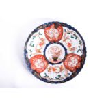 A large Japanese Imari porcelain charger, late 19th century, in metal wall hanging frame, 45.5 cm