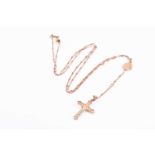 Dolce & Gabbana. An 18ct yellow gold cross pendant necklace, the cross inset with round-cut