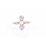 An old-cut diamond and pearl ring, set north to south with a pearl between two old-cut diamonds, the