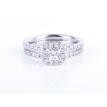 A 14ct white gold and diamond ring by Hearts on Firethe double diamond band centred with a