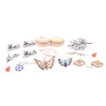 A small group of costume jewellery items, to include earrings, brooches, and clips which may have
