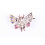 A yellow metal, diamond, sapphire, and ruby butterfly brooch, the abdomen set with small pearls, the