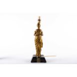 A Victorian gilt-bronzed table lamp, modelled in the form of a classical maiden in long sweeping