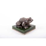 A large Russian silver frog, modelled seated on a square nephrite base, Russian silver marks and
