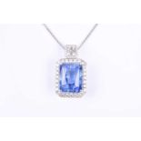 An impressive 18ct white gold, diamond, and sapphire pendant, set with a mixed rectangular-cut Sri