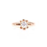 An 18ct yellow gold and diamond ring, eight claw-set with an old round-cut diamond of