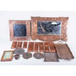 A group of 19th century and later Arts & Crafts style copper items, to include two mirrors (the