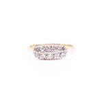 An 18ct yellow gold and diamond ring, set with two rows of five small round-cut diamonds, marekd