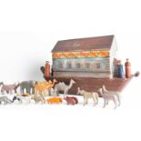 A mid-19th century German Noah's Ark toy, in painted wood with sliding cover to the side, containing