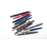 A collection of vintage pens and pencils, to include a Conway Stewart fountain pen in marble